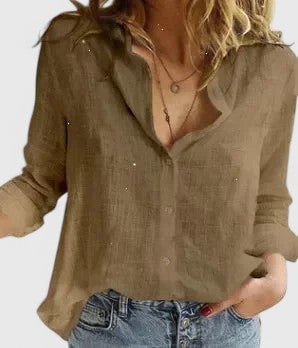 Harper linen shirt in white styled tucked into high-waisted trousers