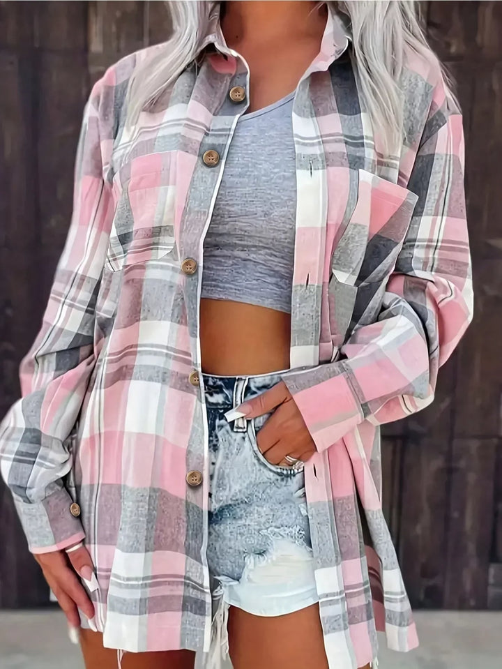 Front view of Harper oversized plaid flannel shirt in pink colorblock pattern with horn-style buttons
