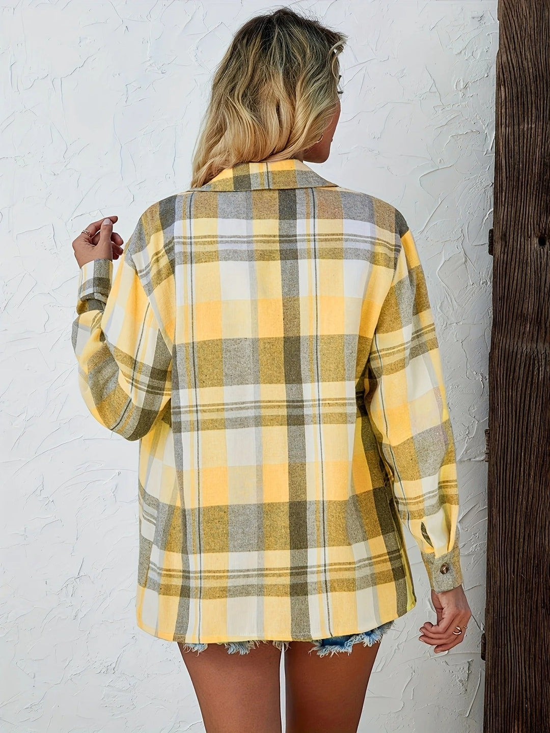 Side view of Harper women's oversized plaid flannel shirt showing relaxed silhouette