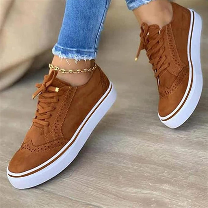 Harper flatform sneaker pair styled with cropped jeans, showing full sole height and overall silhouette