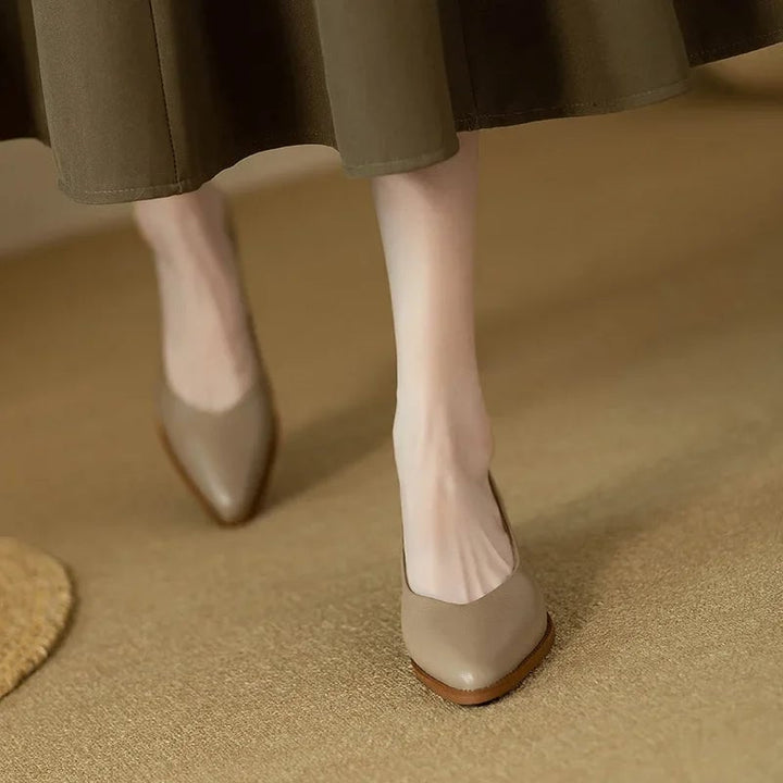 Harriet block heel pump in beige, back view highlighting stacked block heel and pull-tab