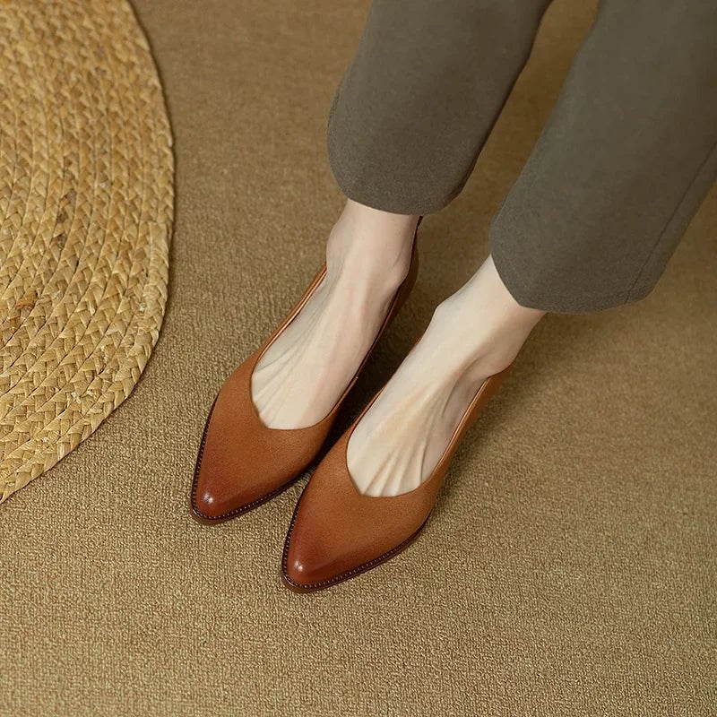 Harriet block heel pump in brown, close-up of heel construction