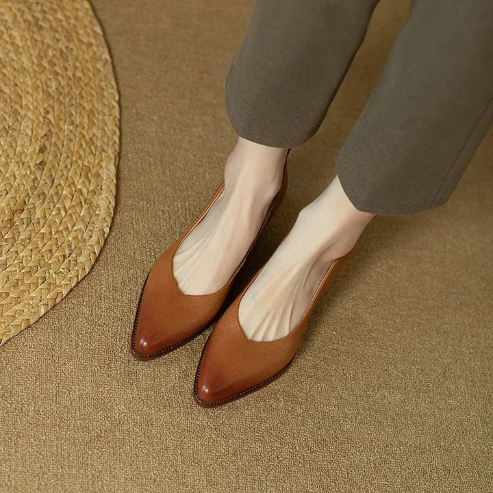 Harriet block heel pump in brown, close-up of heel construction