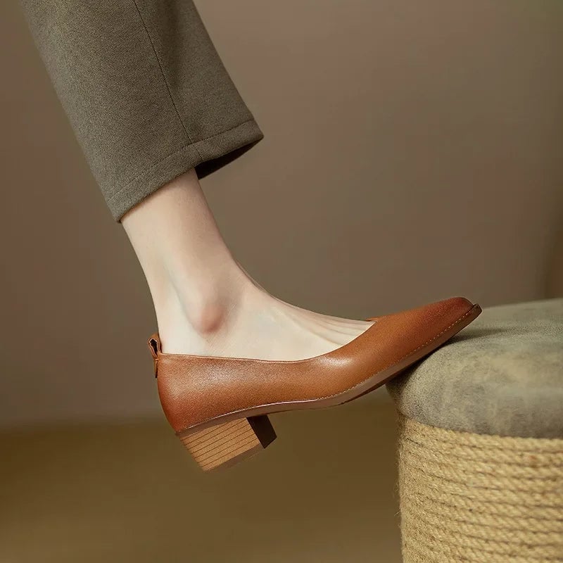 Harriet block heel pump in brown styled with a midi skirt, lifestyle shot