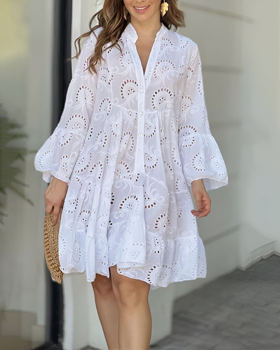 Woman wearing the Haven flowy draped summer dress in white, showing the smooth tummy-control silhouette and relaxed fit