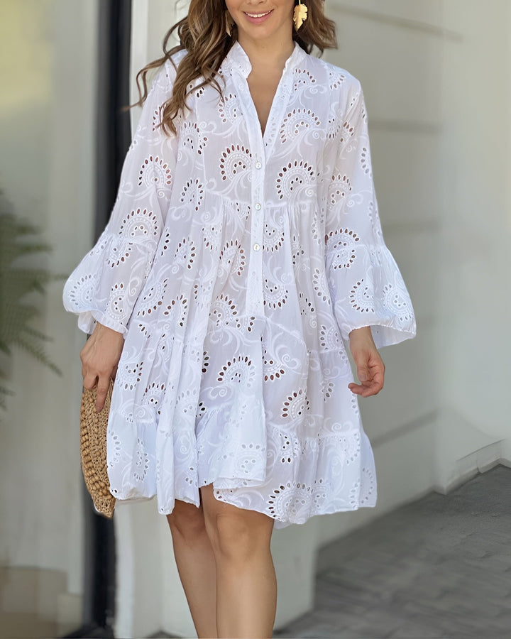 Woman wearing the Haven flowy draped summer dress in white, showing the smooth tummy-control silhouette and relaxed fit