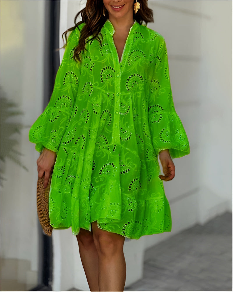 Model wearing the Haven dress in green, highlighting the lightweight fabric and gentle movement