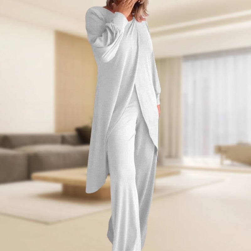 Woman wearing the Haven two-piece set in khaki with a relaxed high-low tunic top and wide-leg pants, front view