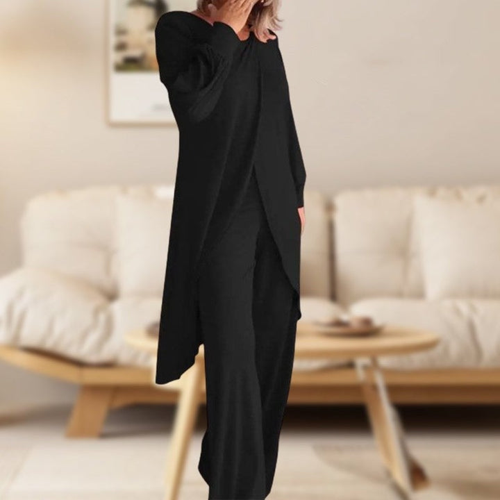 Back view of the Haven tunic and wide-leg pants set showing the longer high-low hemline in khaki