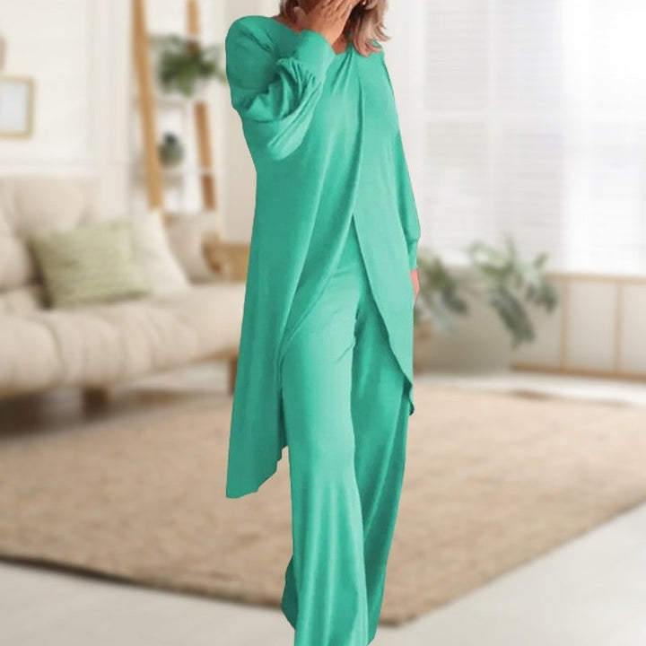 Side view of the Haven wide-leg pants showing the elastic waist and straight-cut leg silhouette