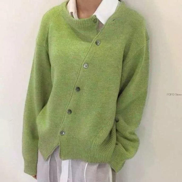 Model styling the Hazel chic cardigan in grey over a casual outfit, showcasing its relaxed drape