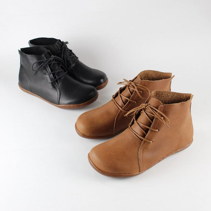Front-facing view of Hazel ankle boots in brown showing toe box and upper detailing