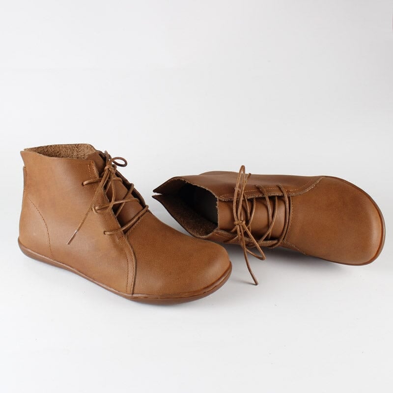 Hazel ankle boots in black and brown displayed side by side for color comparison