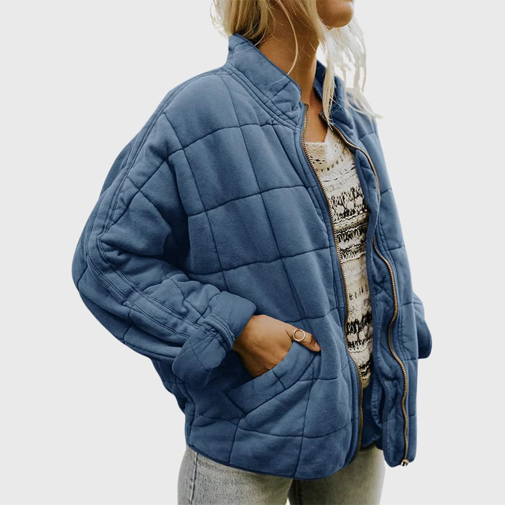 Front view of the Hazel quilted jacket in green, showcasing the flattering oversized silhouette and clean finish