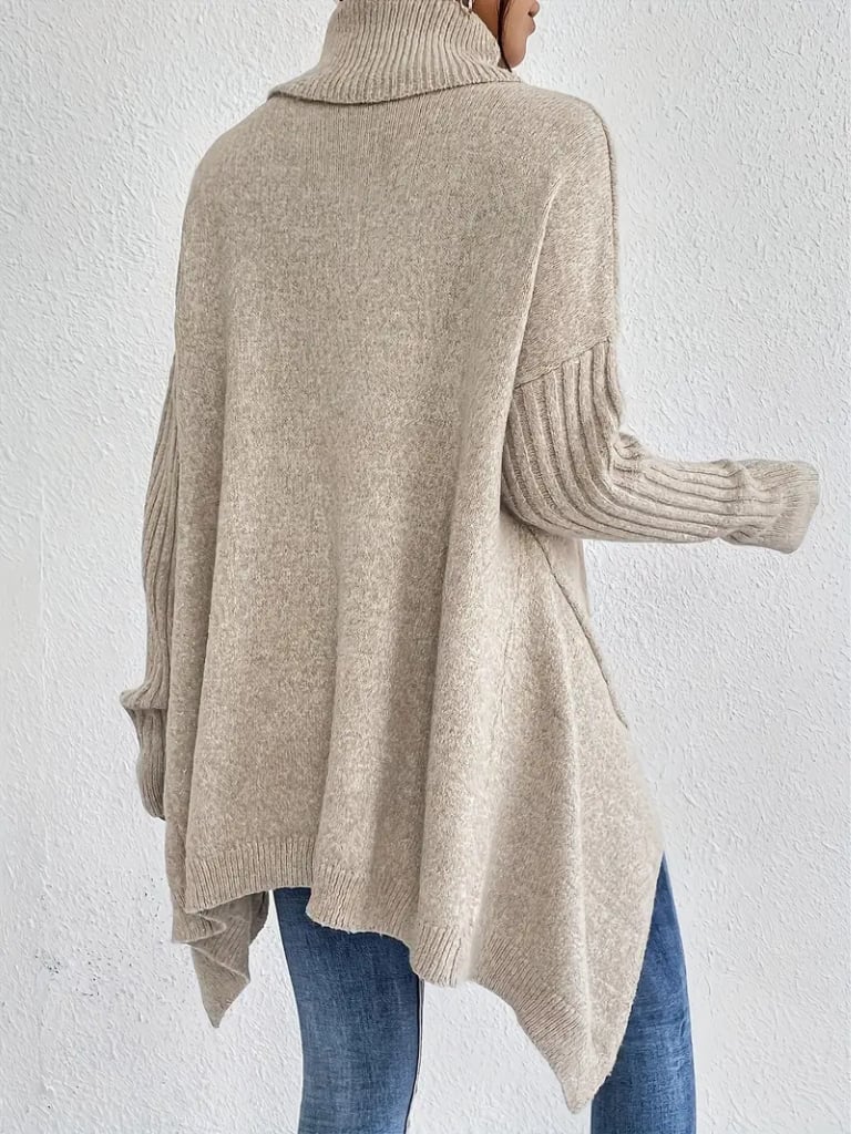 Model in the Hazel sweater in gray styled with a midi skirt for a weekend outfit