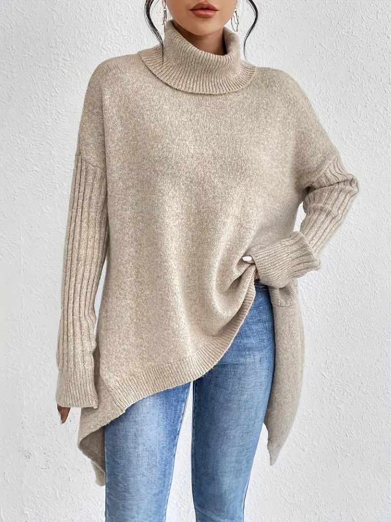 Full-length shot of the Hazel elegant long sleeve sweater in beige on a model
