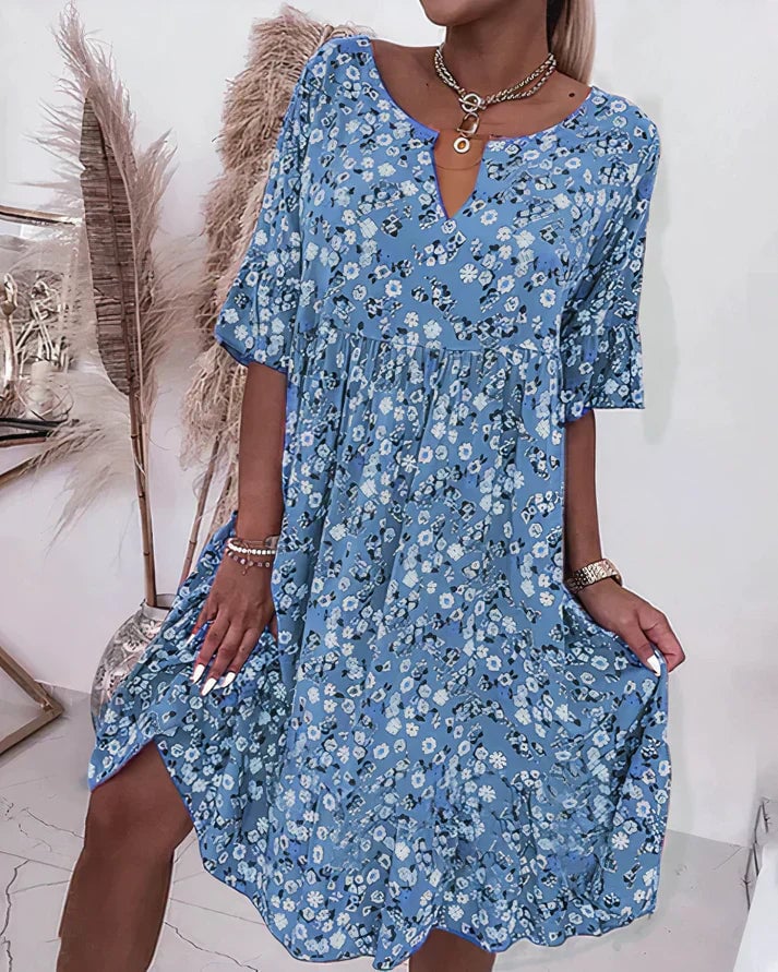 Front view of the Hazel women's shift dress in blue, a chic and comfortable cocktail style