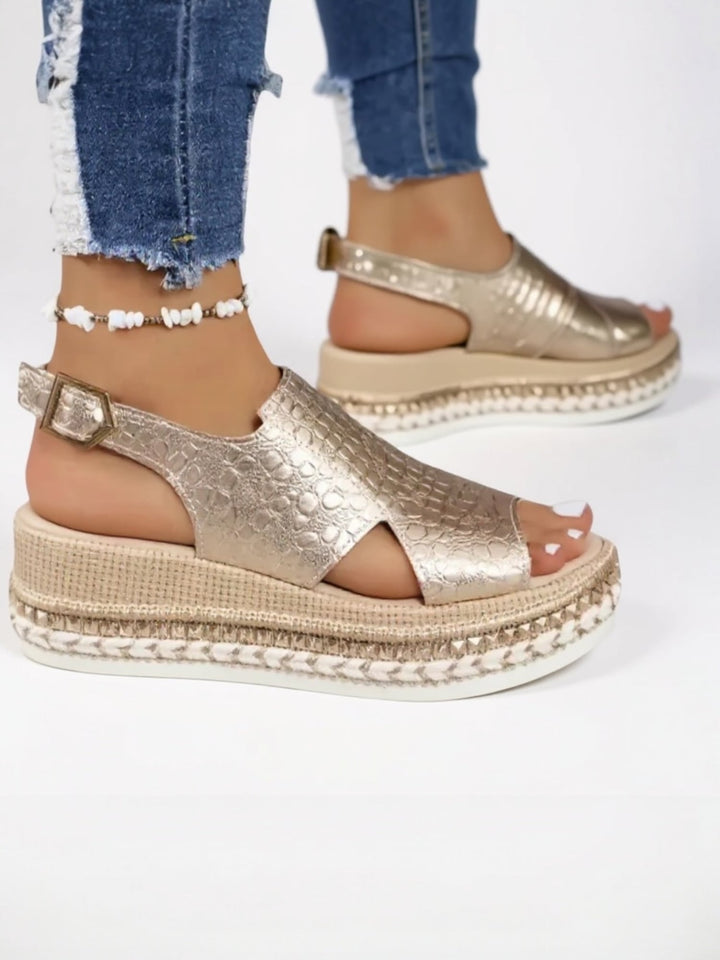 Side profile view of Hazel gold cushioned platform sandals highlighting the platform sole