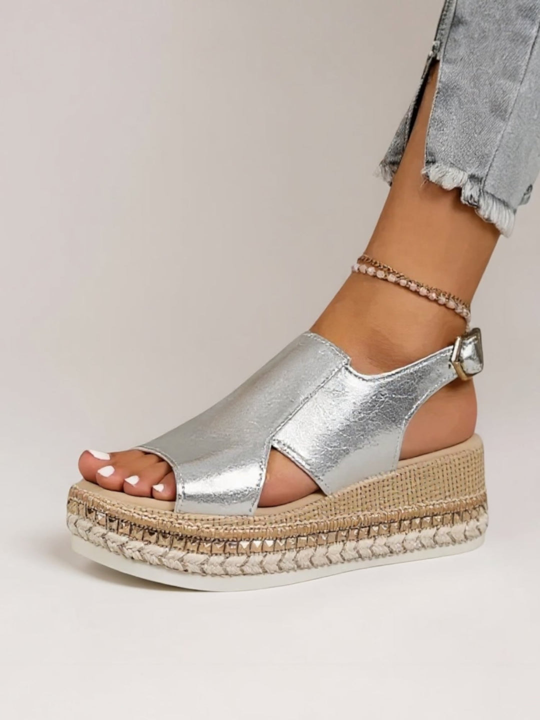 Close-up of the metallic sheen detail on Hazel silver cushioned sandals