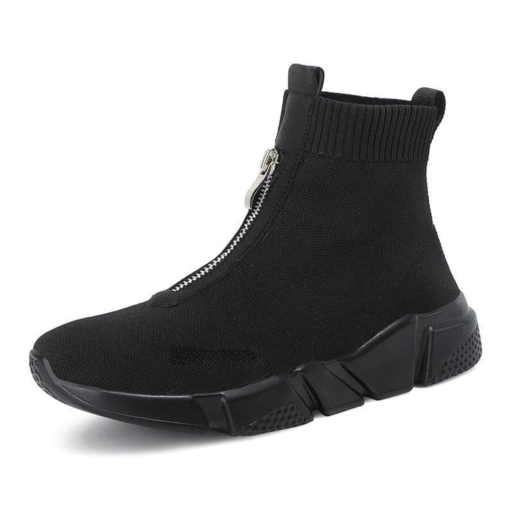 Women's black leisure sock boots with a slim, stretchy fit shown from the front on a plain background
