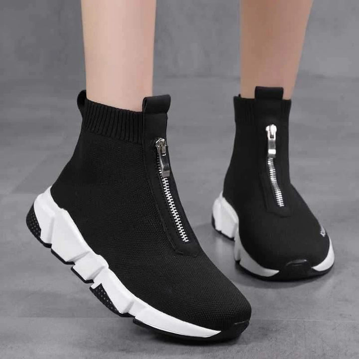 Side profile view of the Hazel women's sock boot highlighting its leg-lengthening silhouette