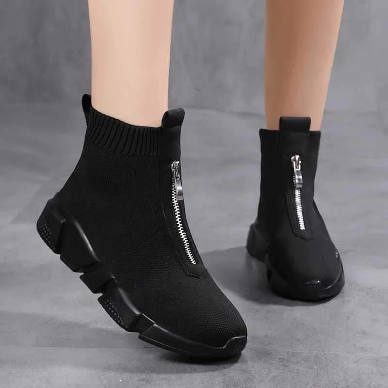 Black and white colorway of the Hazel leisure sock boot styled with a casual outfit