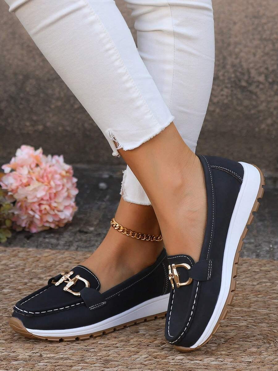 Hazzie navy loafers side view showing rubber outsole and elevated midsole