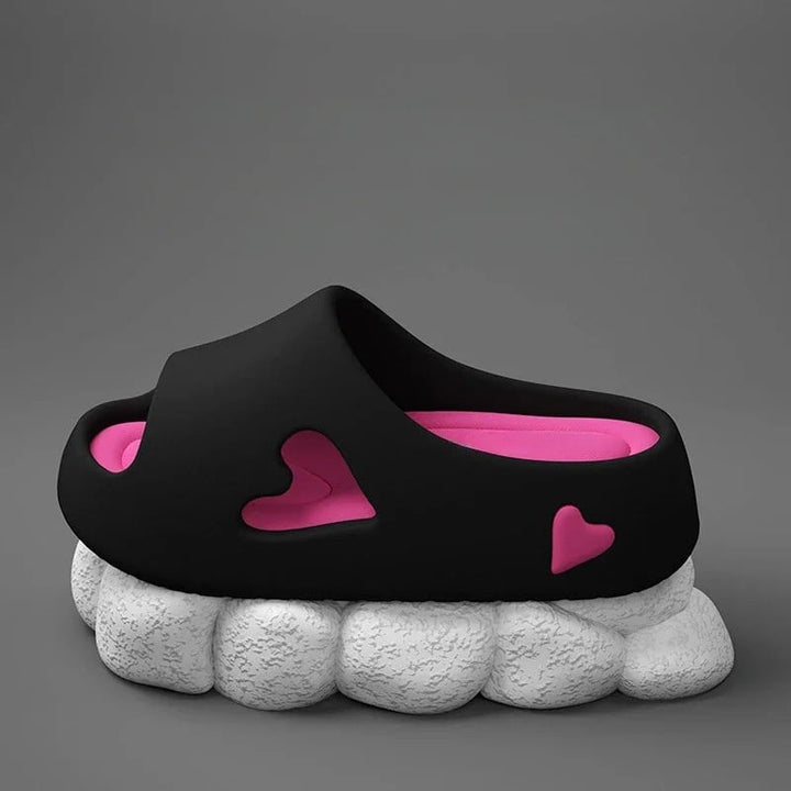Top-down view of heart flip flops showing EVA foam footbed and heart cutout design