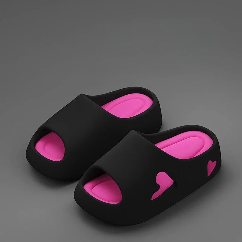 Side profile of heart flip flops showing slightly raised platform sole