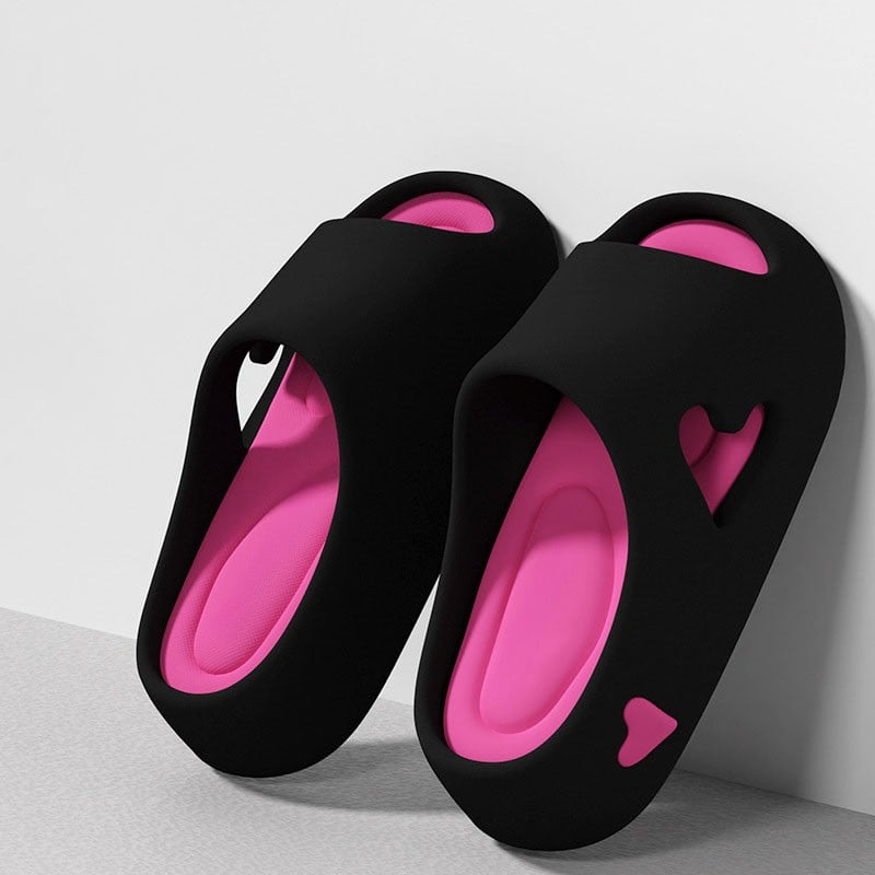 Close-up of heart-shaped cutout detail on flip flop strap