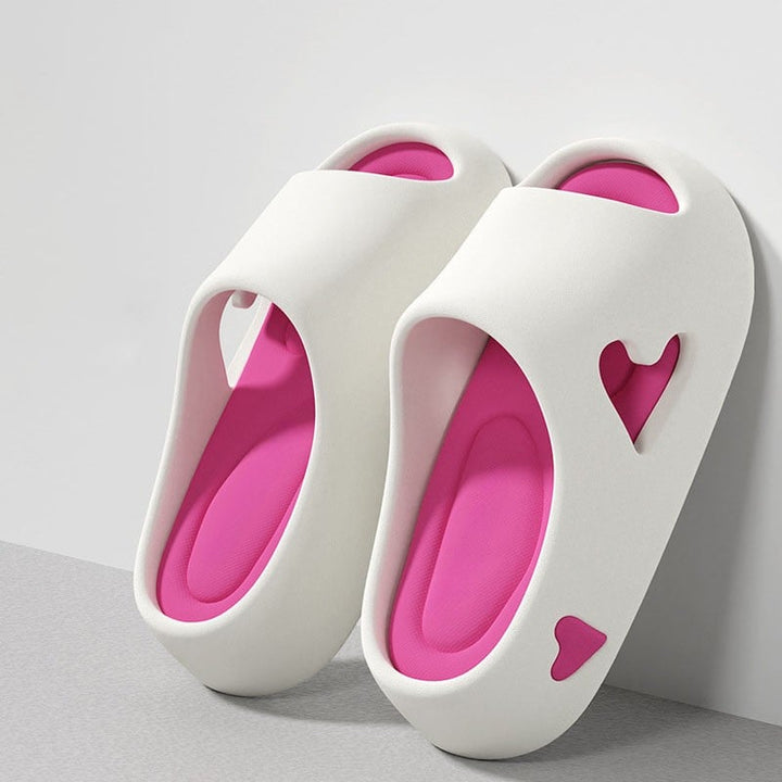 Woman wearing heart flip flops in a casual summer outfit