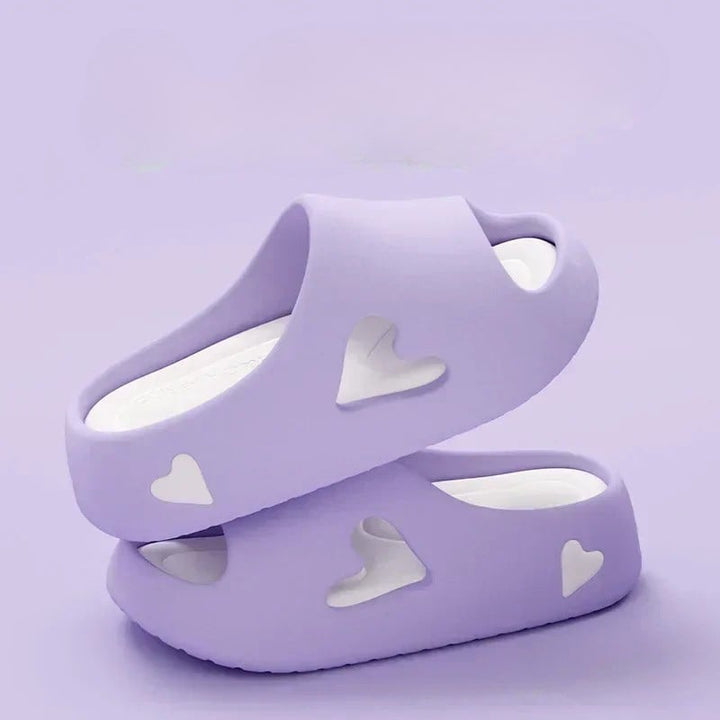 Heart flip flops in all four colors: purple, khaki, black, and white