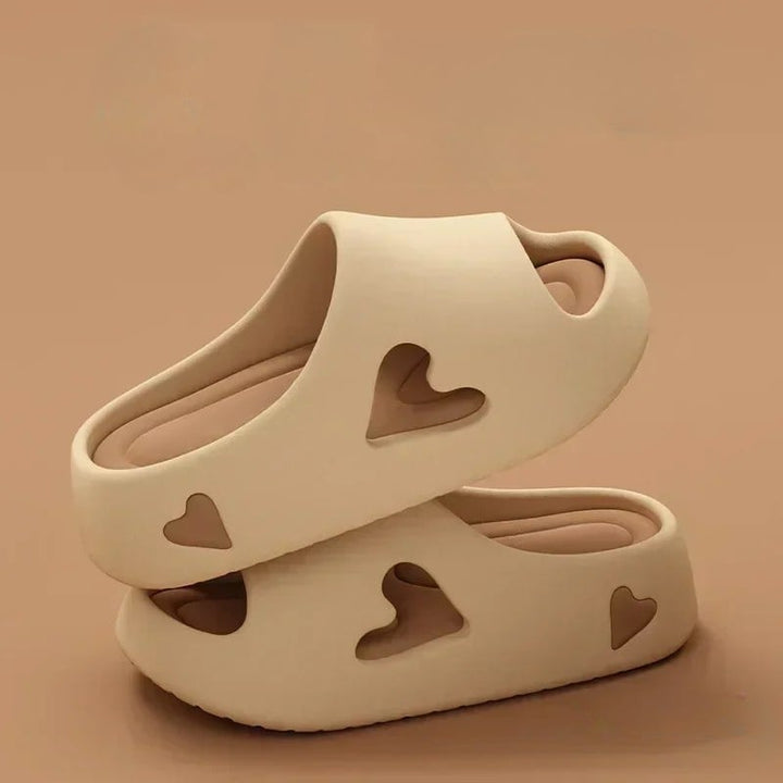 Underside of heart flip flops showing durable lightweight sole