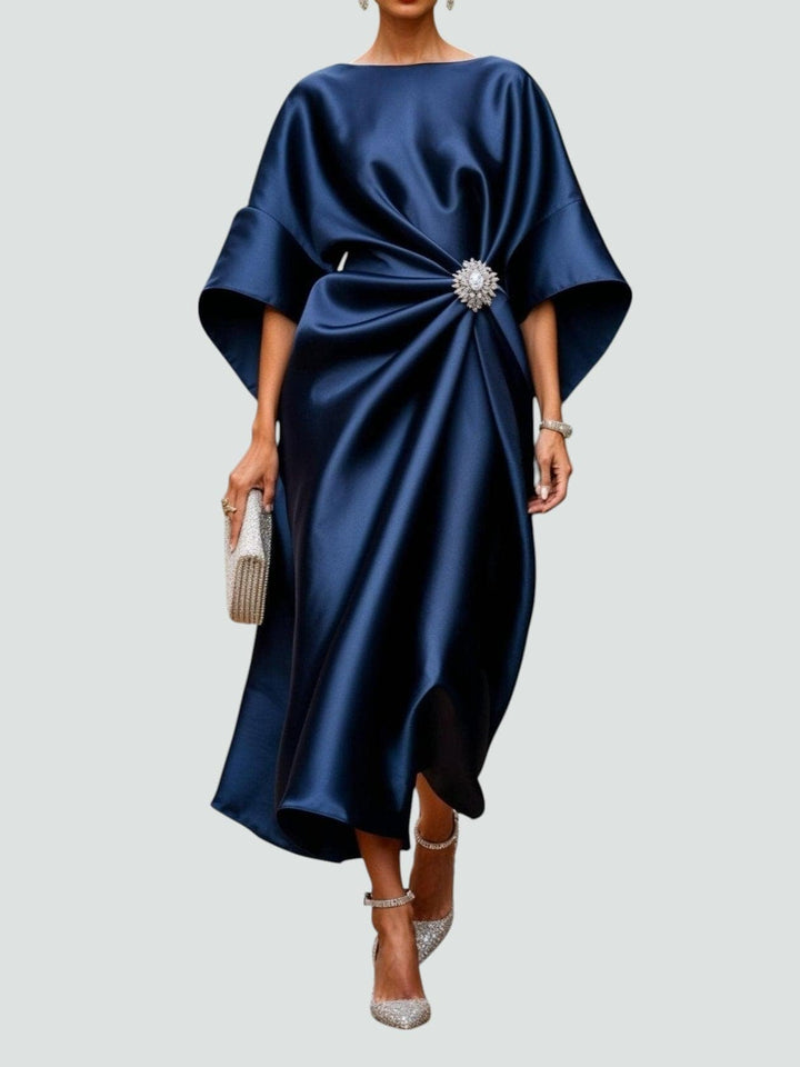 Front view of the Heather elegant long dress in Navy with a flattering full-length silhouette and subtle sheen