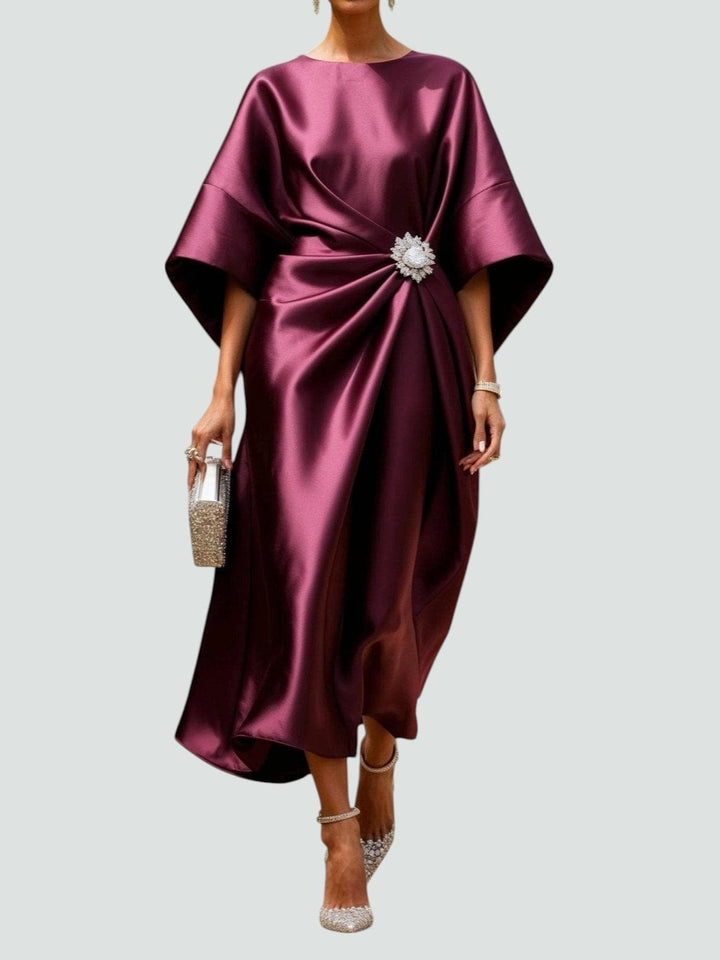 Close-up detail of the Heather long dress fabric showing its refined lustrous finish