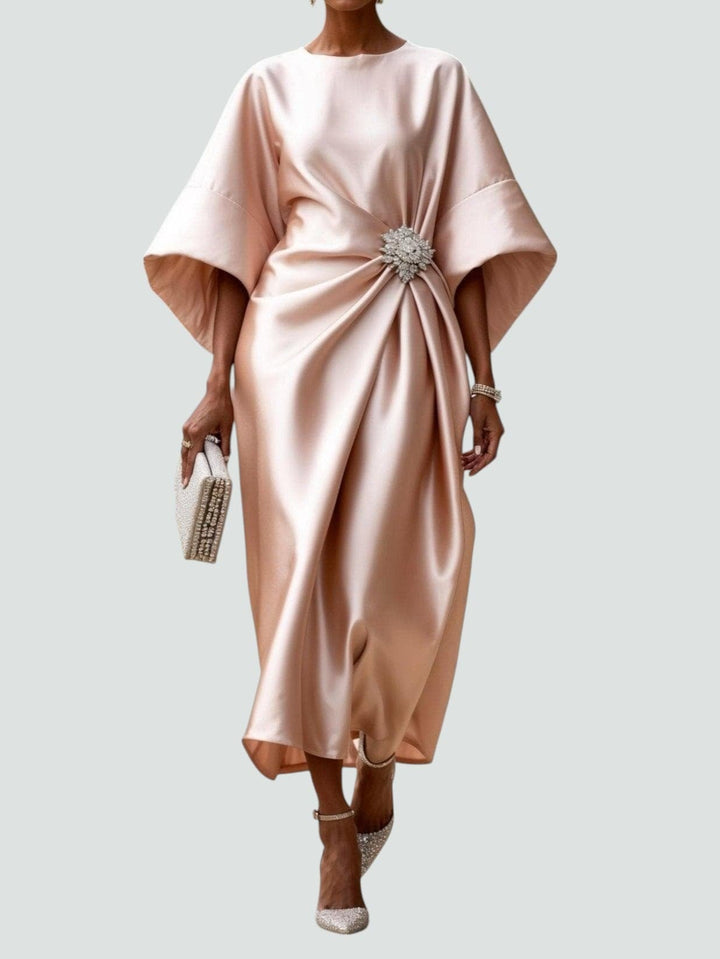 Back view of the Heather elegant long dress in Pink showing the clean, polished silhouette