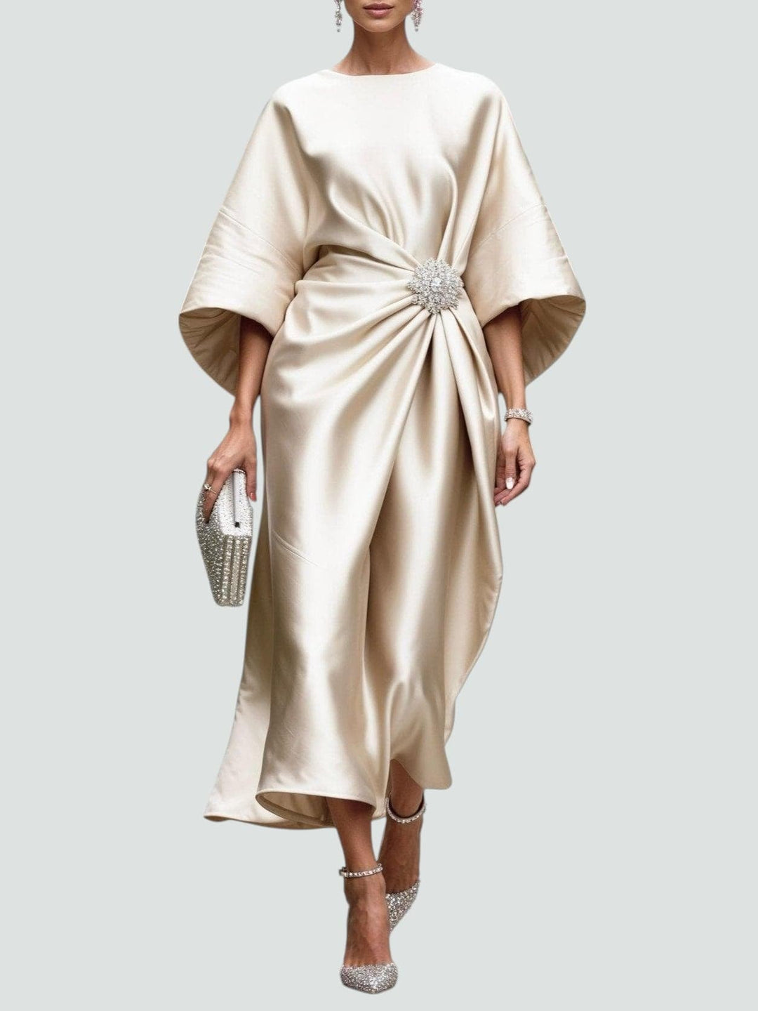 Heather long dress in Beige displayed on a model in a bright setting, ideal for wedding guest looks