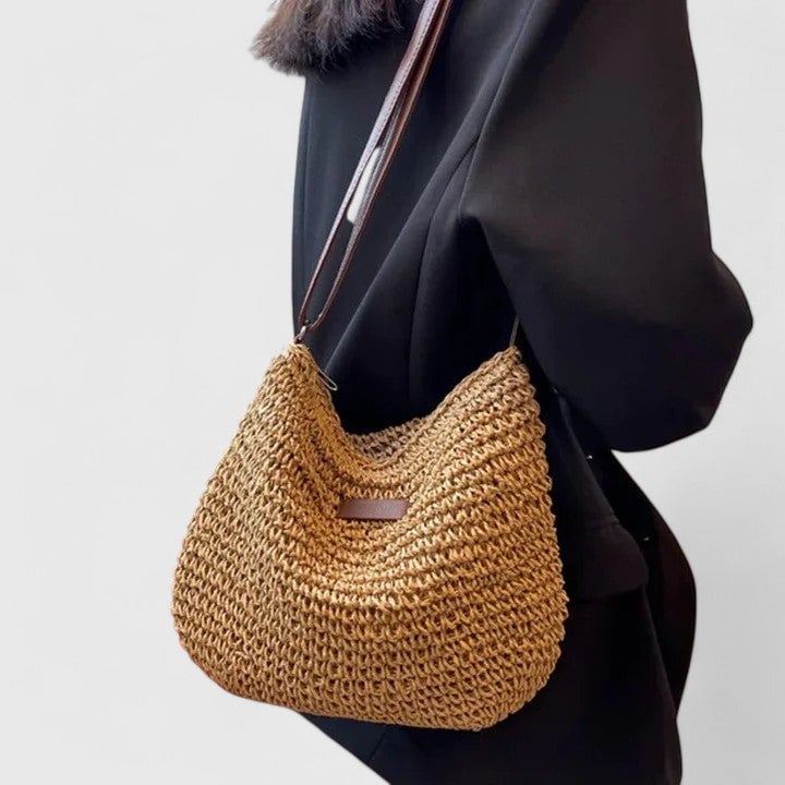 Hedda shoulder bag in beige with relaxed silhouette, shown from the front against a neutral background