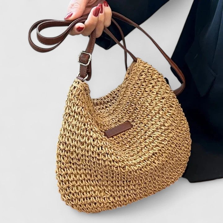 Close-up of the Hedda shoulder bag in khaki highlighting strap and clasp details