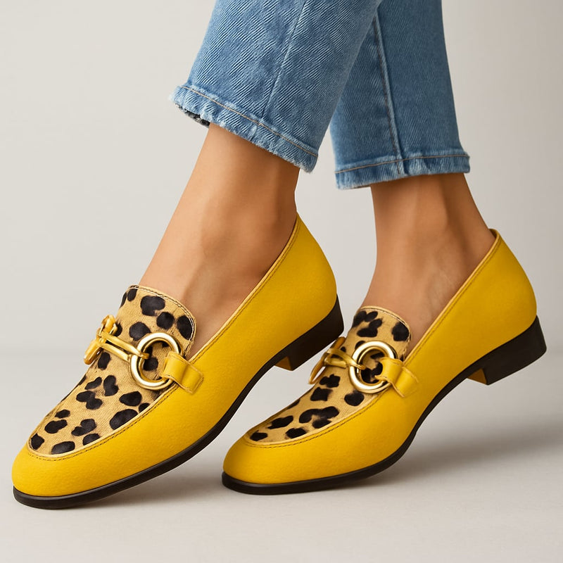 Yellow Heidi loafers with a classic silhouette and cushioned insole, shown from a front three-quarter angle