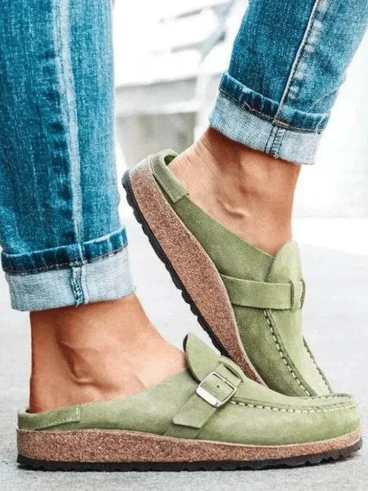Side profile of Helen comfort clogs in sage green showing the supportive ergonomic sole