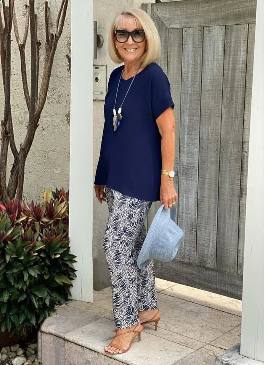 Side profile of the Florimay Coastal Set in navy blue highlighting the drape and relaxed fit of the wide-leg pants