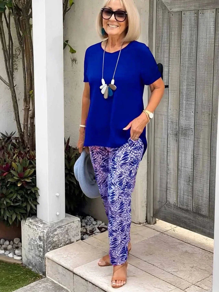 Detail shot of the artistic pattern on the Florimay Coastal Set blouse in blue