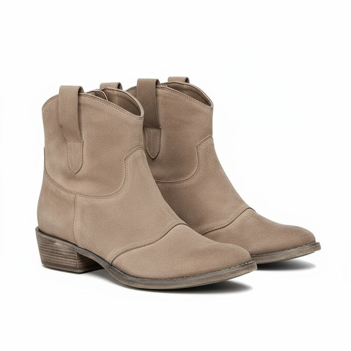Henny vintage cowboy ankle boots in brown with Western stitching detail and rustic finish, side view