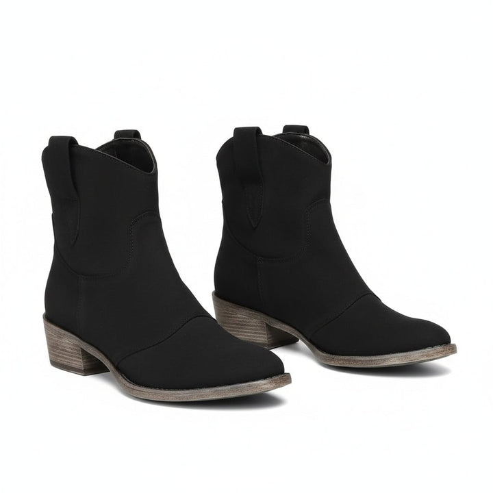 Close-up of Henny cowboy ankle boot toe and Western stitching detail