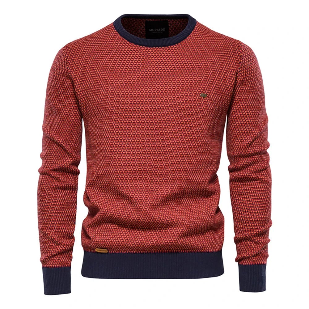 Man wearing a classic checkered sweater with ribbed cuffs and collar in a relaxed tailored fit