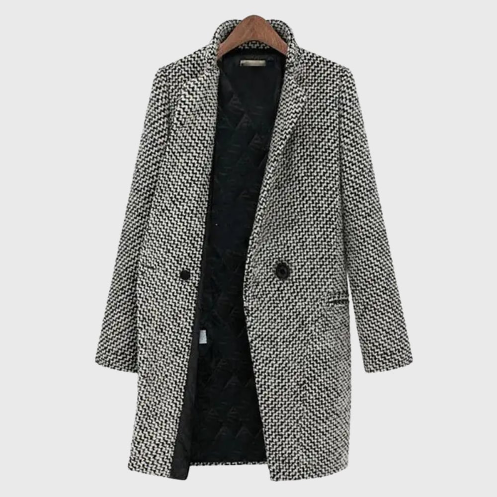 Woman wearing the Herlie warm winter coat in grey, showing the full-length tailored silhouette from the front