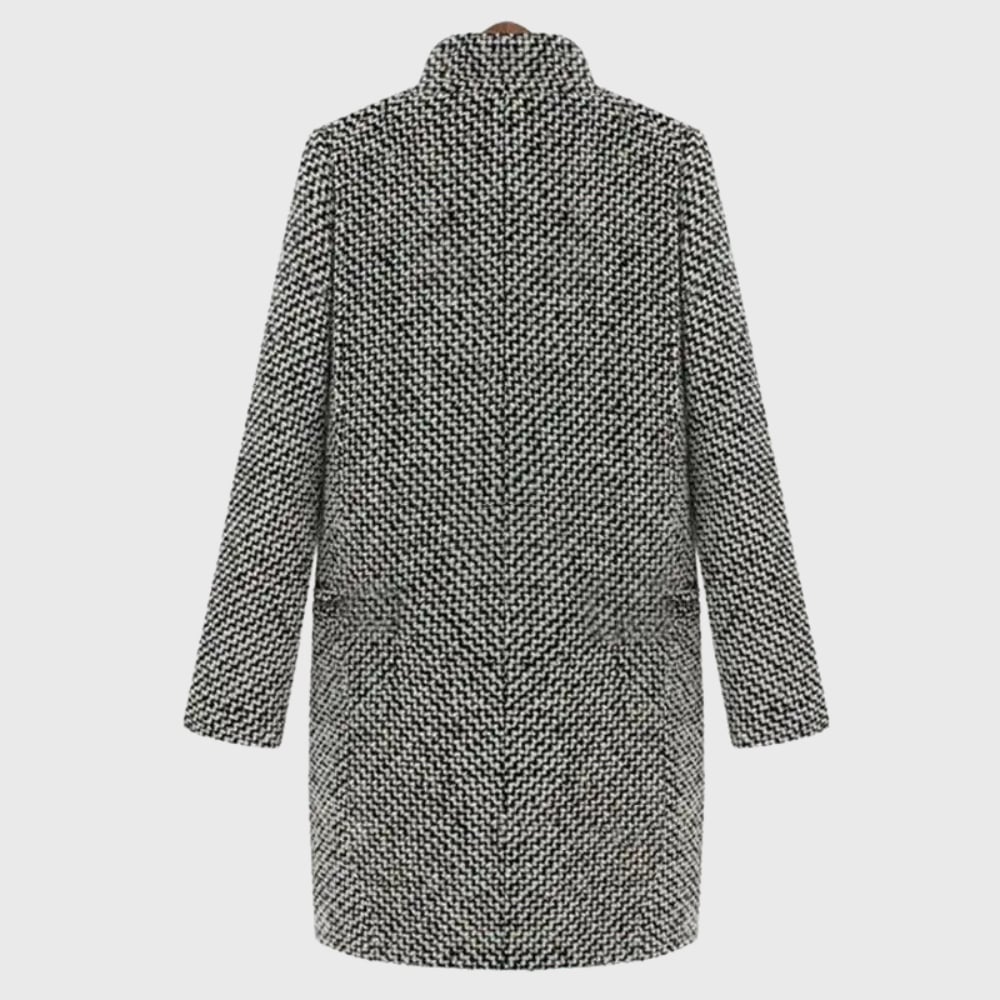 Close-up of the Herlie grey winter coat highlighting the insulated fabric texture and secure front closure