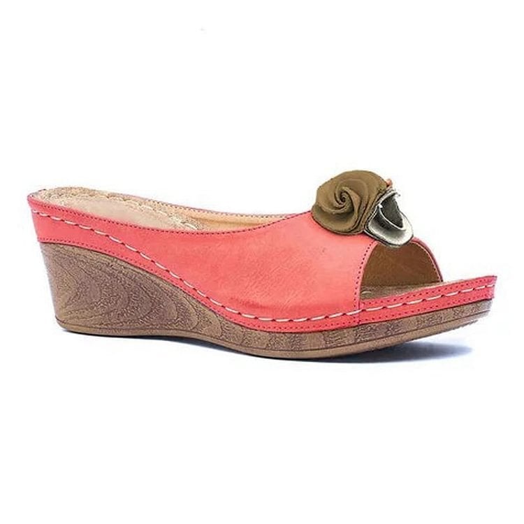 Close-up of Heron wedge sandal strap and cushioned footbed detail in brown