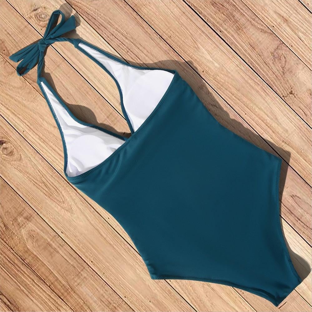 Detail shot of the Hilda swimsuit fabric and secure fit around the torso